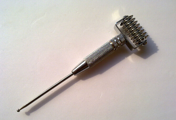 Face-rolled spring ear needle